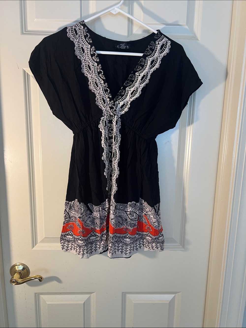 Angie Black Tunic with White Lace Trim and Red Border